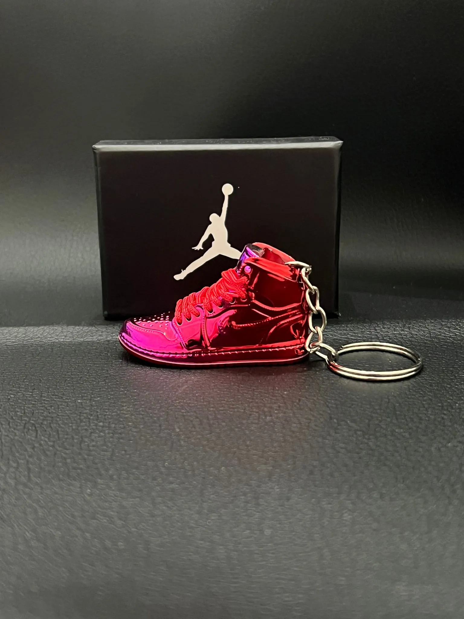 Porte-clés Air Jordan rouge/rose miroir