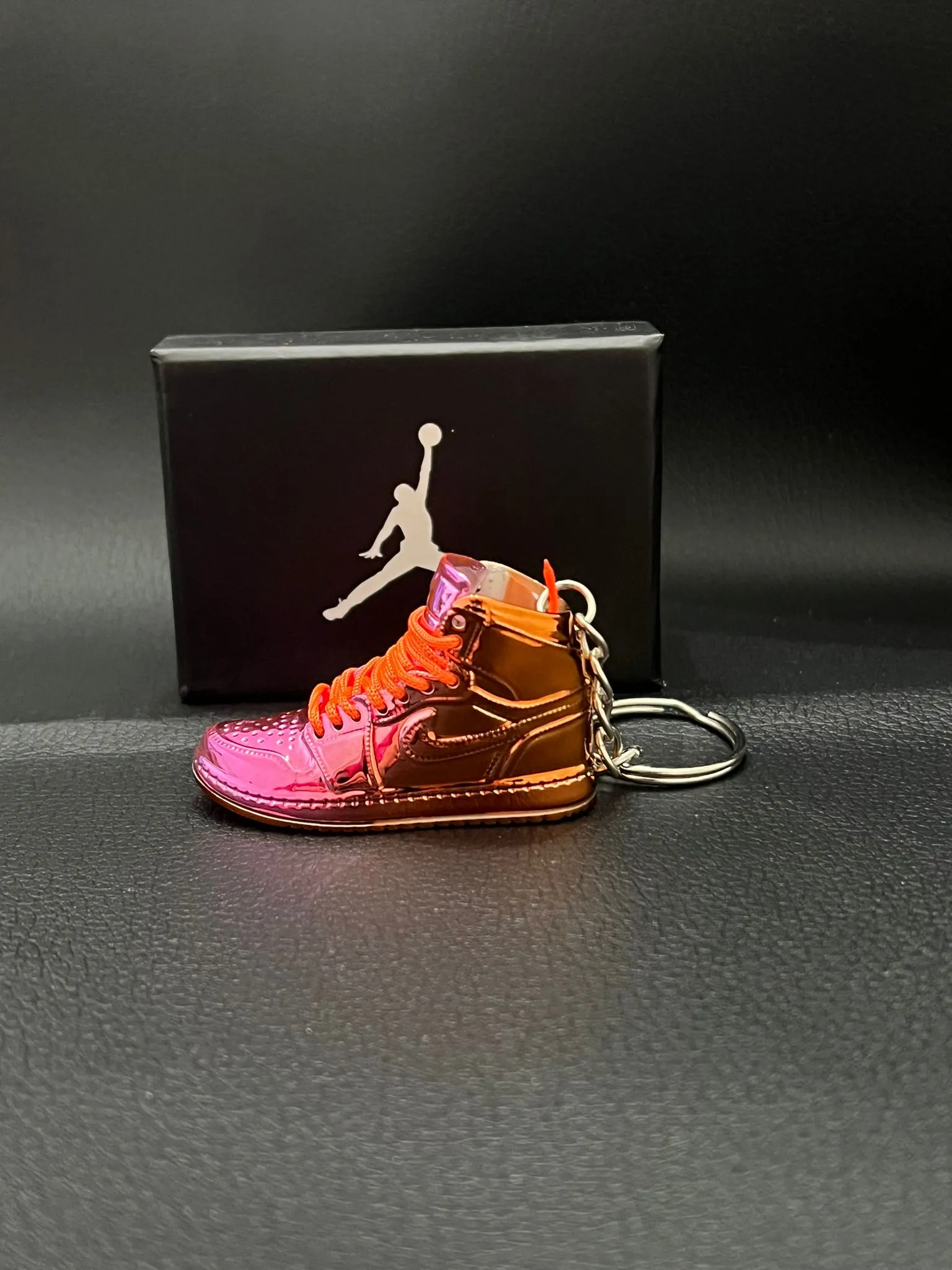 Porte-clés Air Jordan orange/rose miroir