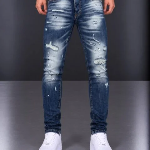 Jeans Slim Fit Denim Blu Sfumato con Strappi e Schizzi di Vernice